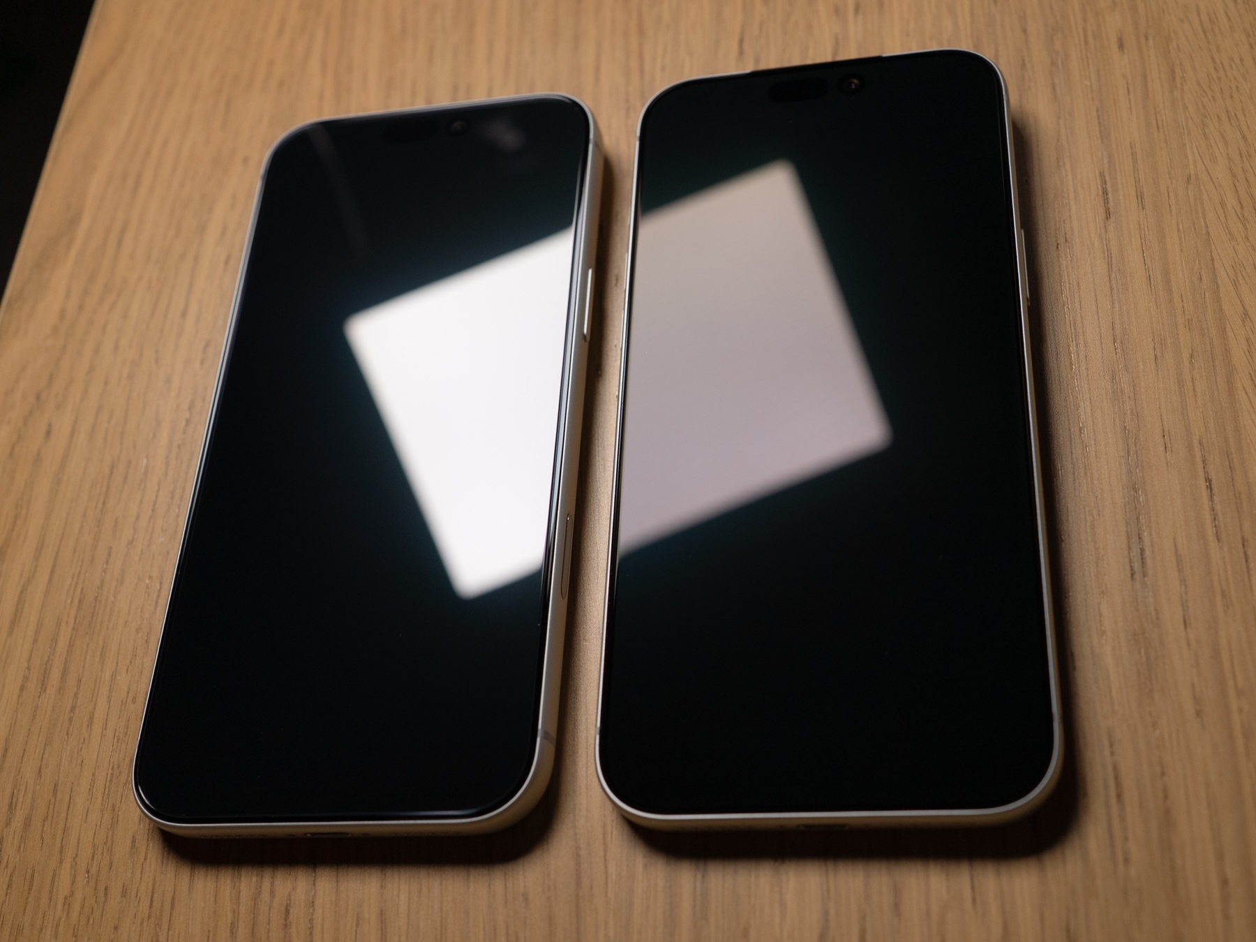The budget protector on the left produces a much brighter reflection than the premium one on the right