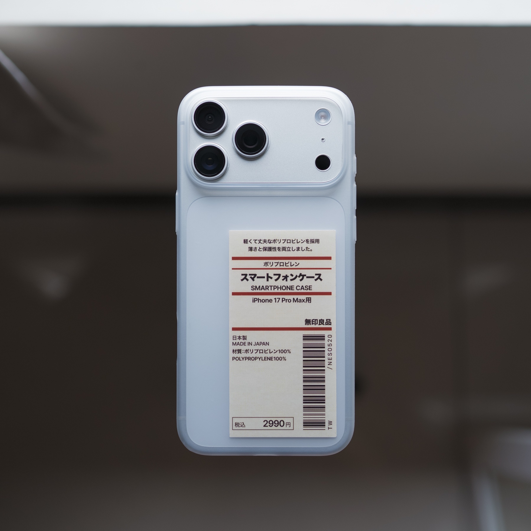 A polypropylene phone case with a homemade MUJI-style label